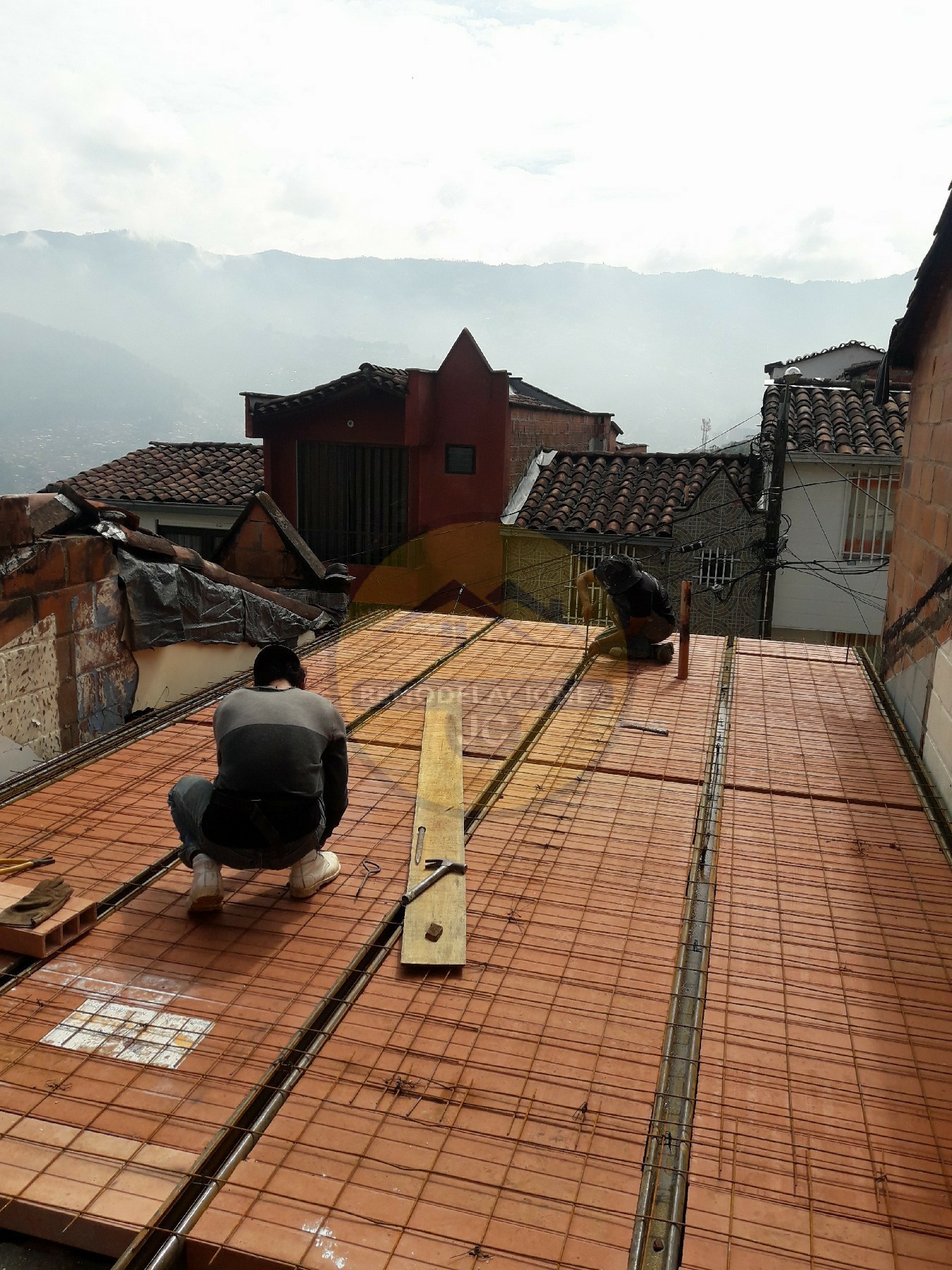 instalación de malla electrosoldada para firmeza de losa